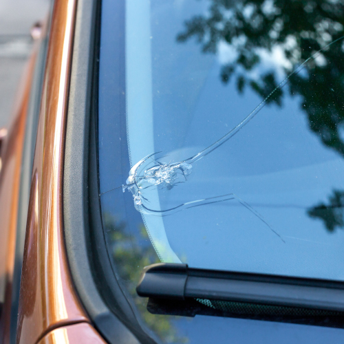 Broken car windshield glass from stone